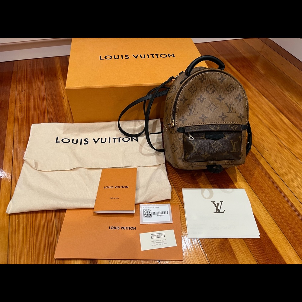 Authentic Louis Vuitton palm spring mini in reverse monogram